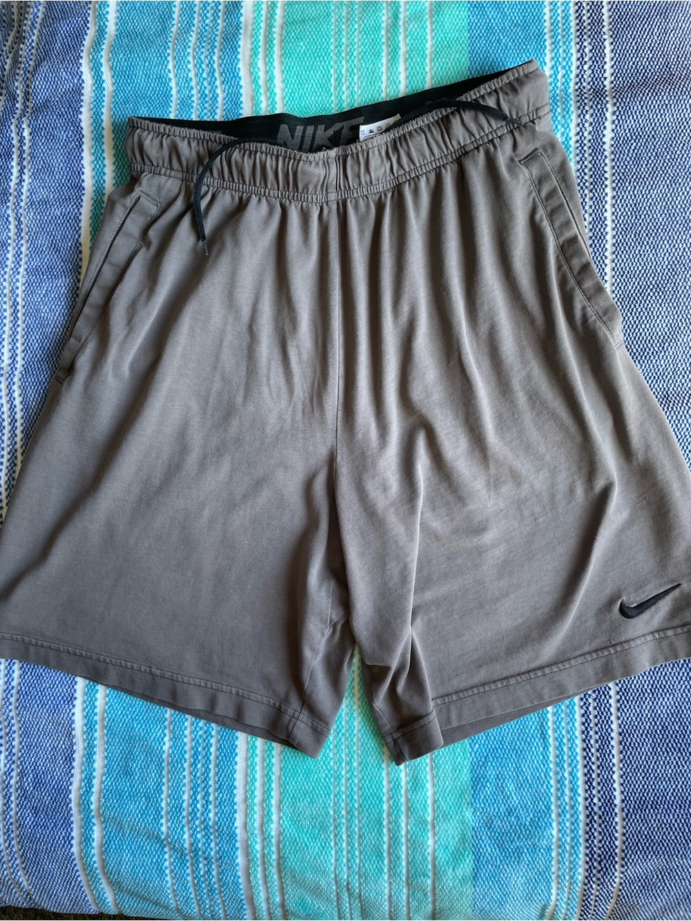 Nike Men's Gray Athletic Shorts with Black Swoosh